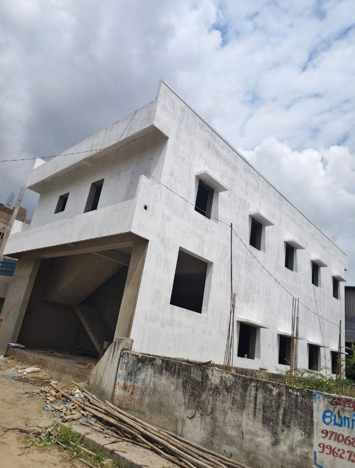 Multi-Story White Plastered Building Site